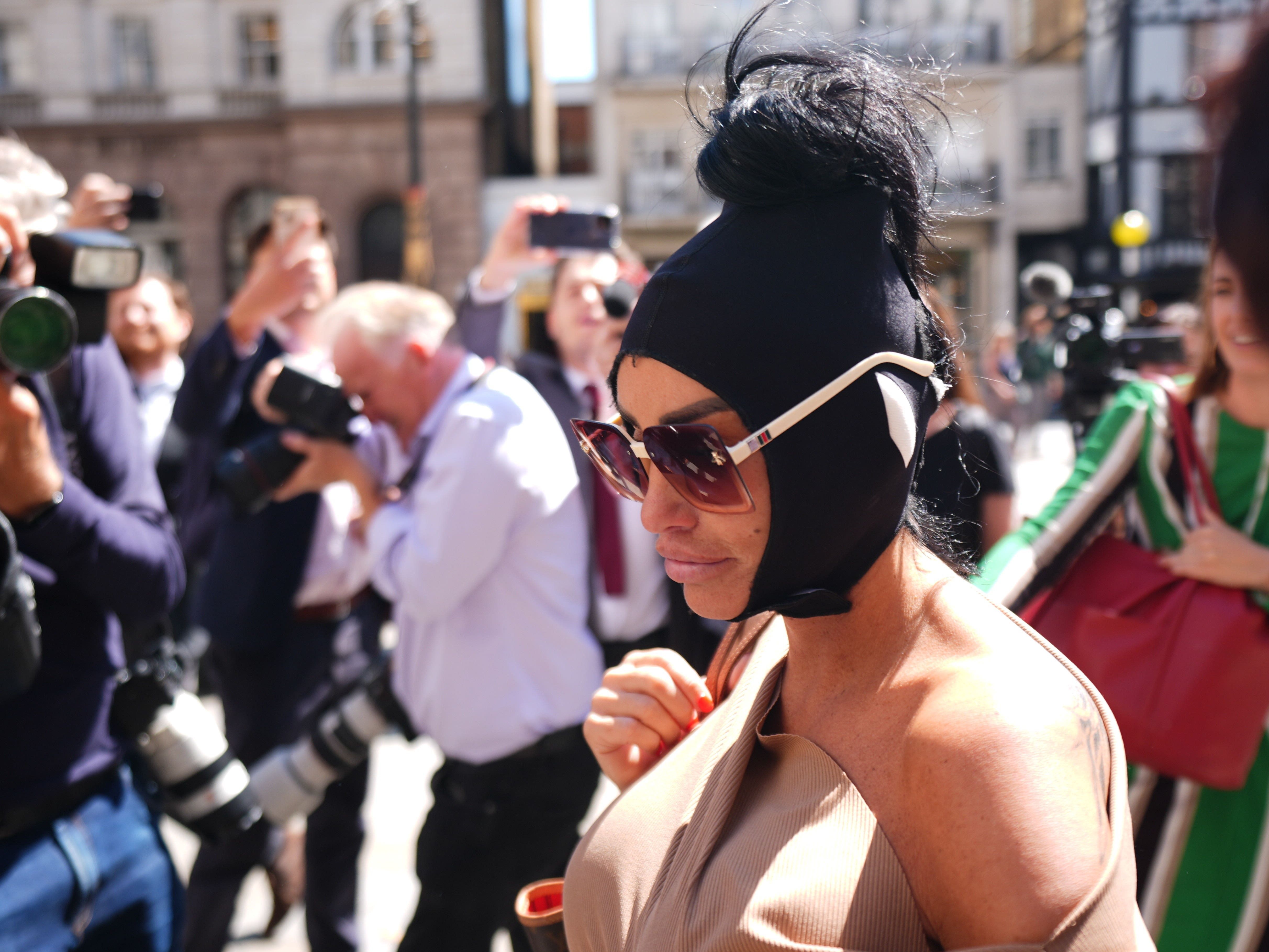 Katie Price arrives at court in London for bankruptcy hearing following arrest