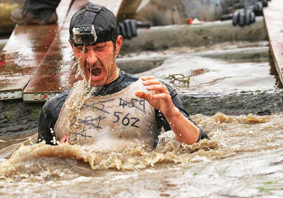 Video and gallery: Hundreds brave fire, mud and barbed wire to take on ...