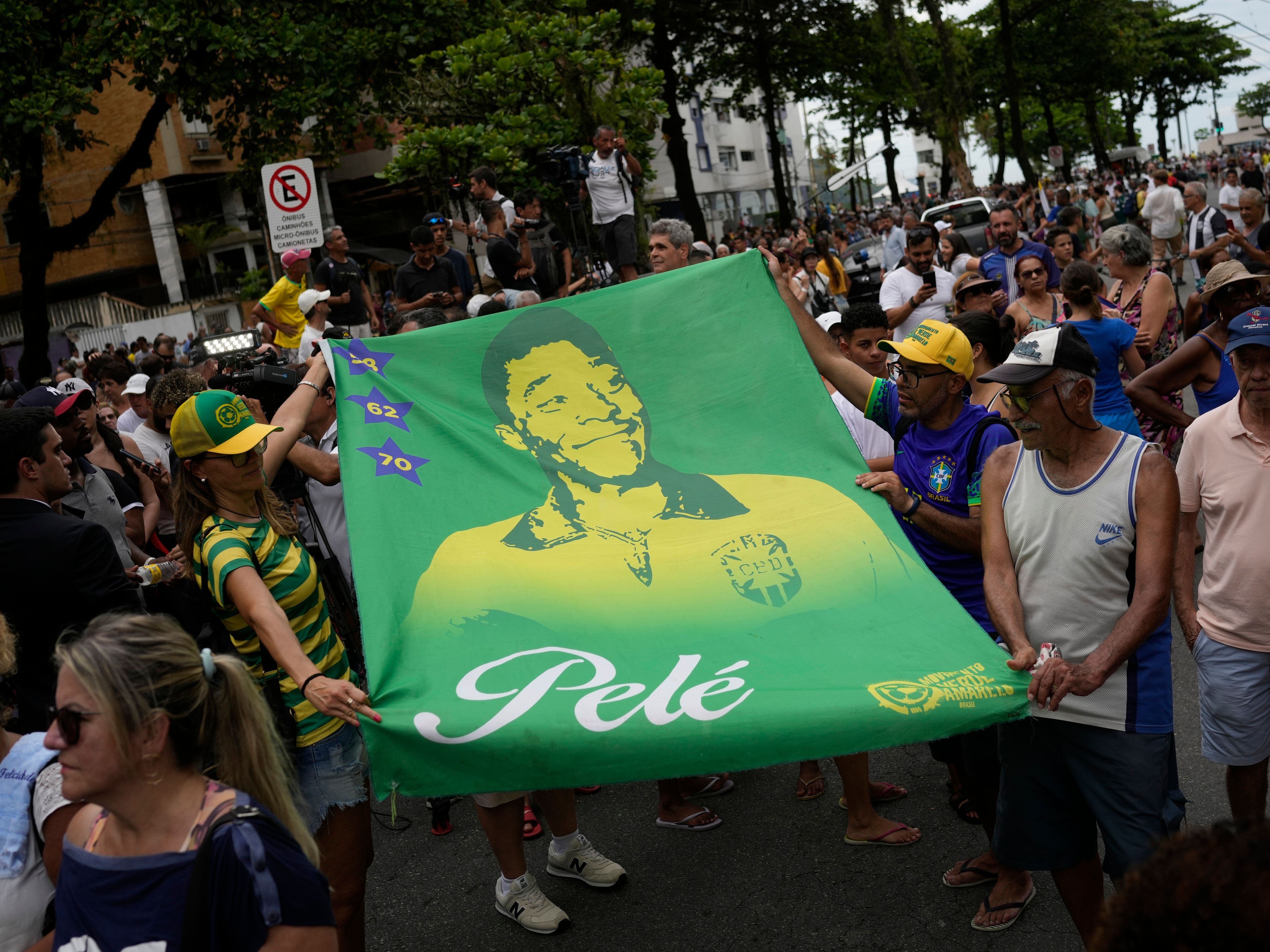 Pele buried at cemetery in Brazilian city he made famous