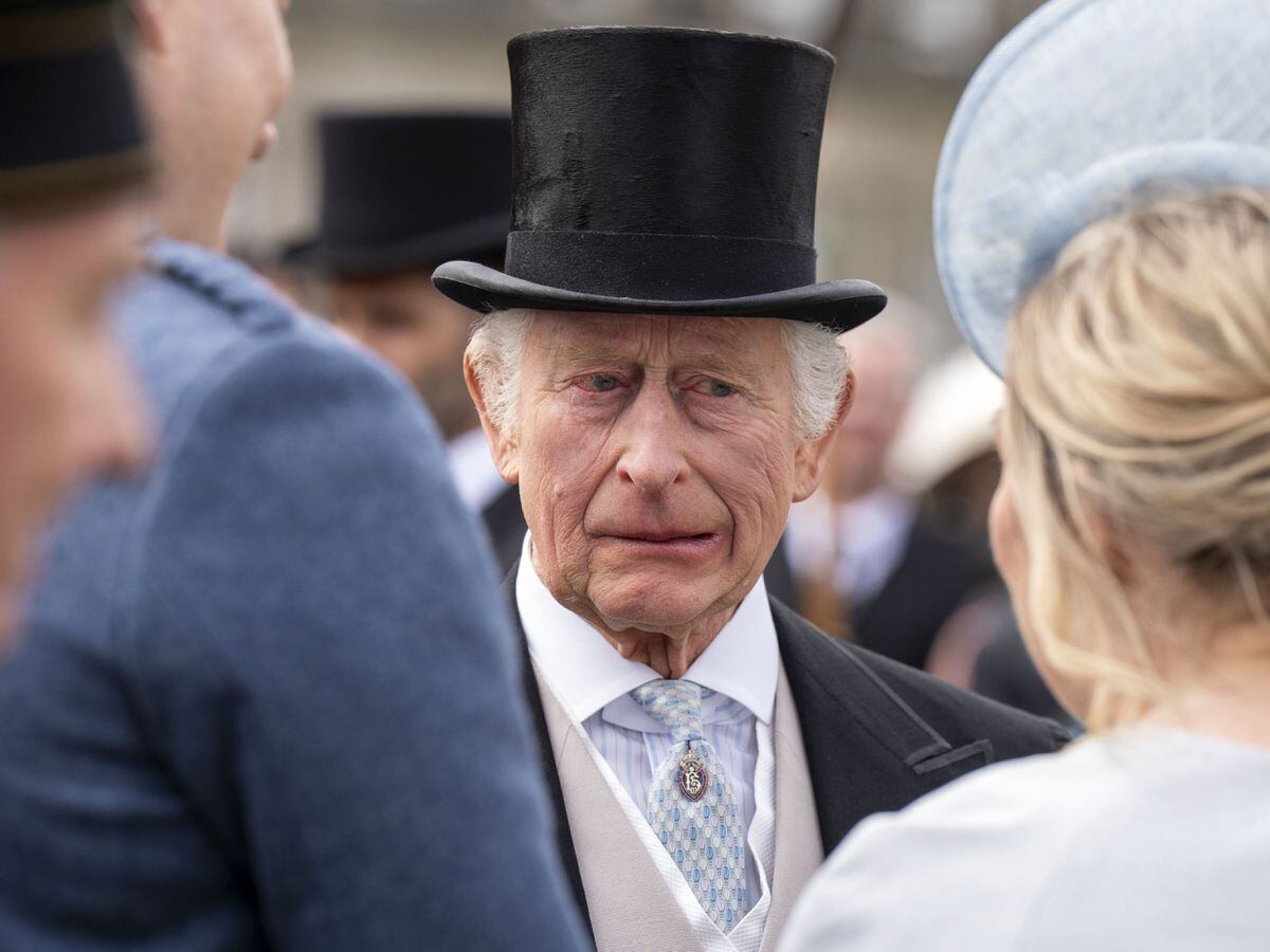 Charles shares memories of school cricket match as he hosts garden party