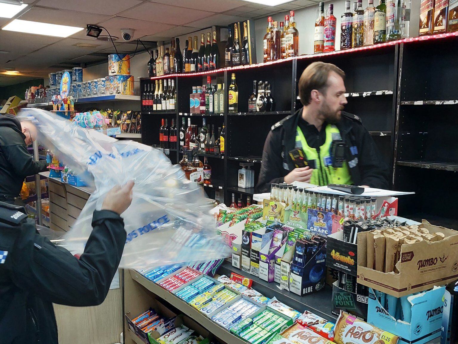 Police and trading standards empty shop's shelves of booze after licence warnings