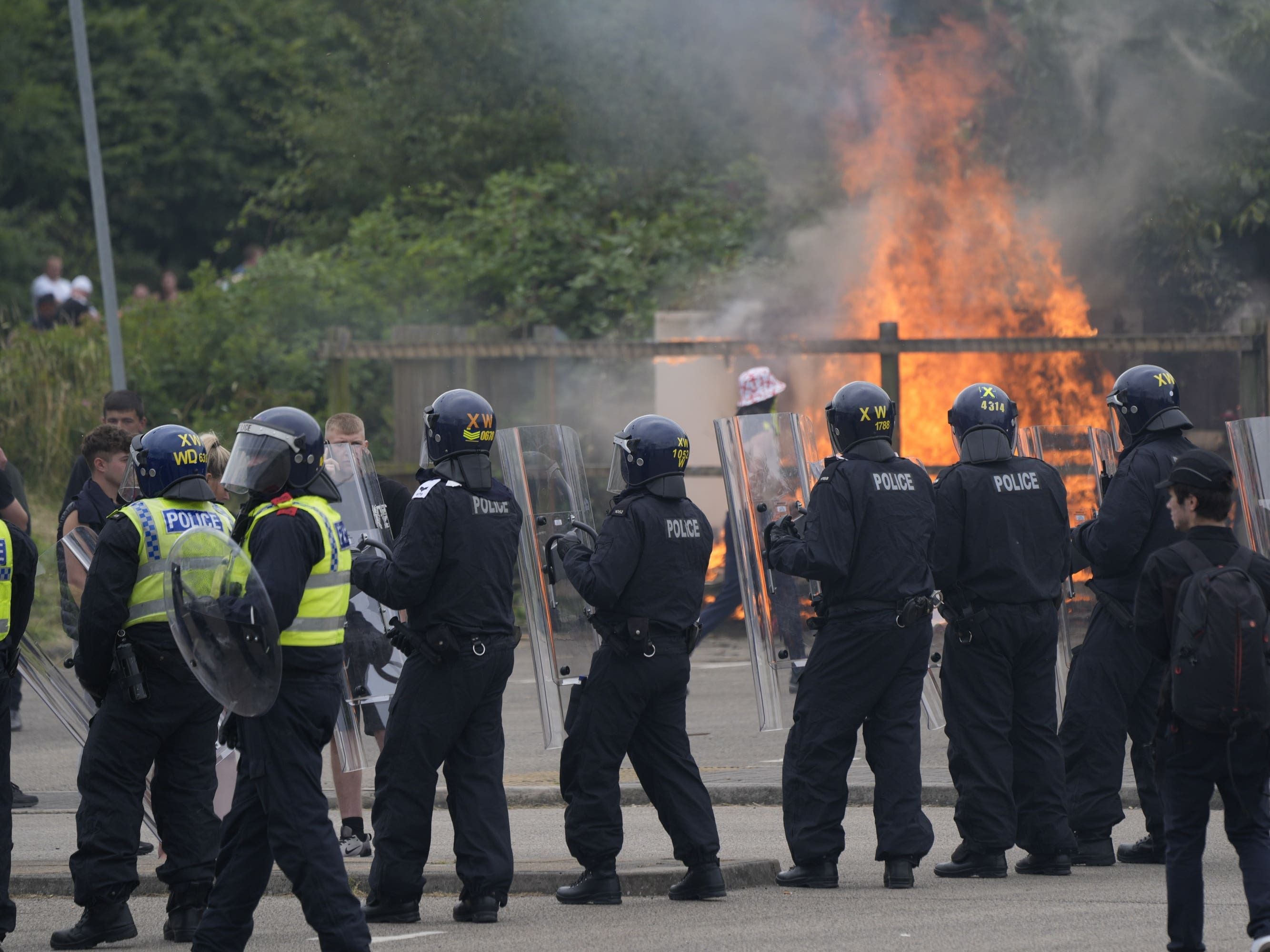 Holiday Inn owner urges calm after attacks on two hotels housing asylum seekers