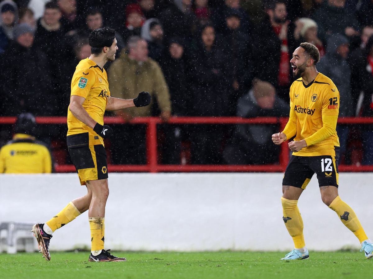 Raul Jimenez of Wolverhampton Wanderers celebrates with teammates Matheus Cunha after scoring the team's first goal during the Carabao Cup Quarter Final match between Nottingham Forest and Wolverhampton Wanderers at City Ground on January 11, 2023 in Nottingham, England.  (Photo by Jack Thomas - WWFC/Wolves via Getty Images).