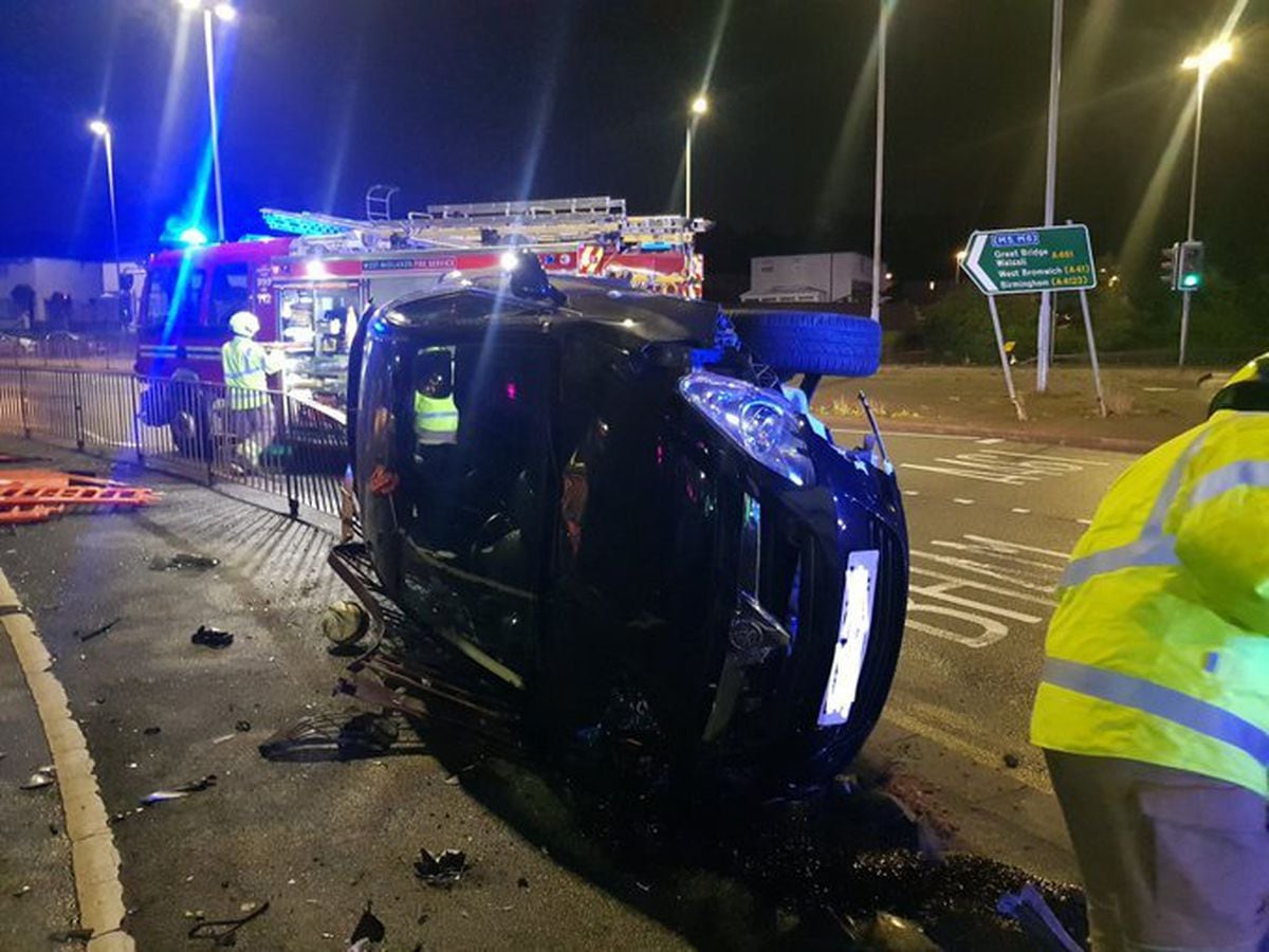 Driver and passenger unhurt as car flips onto its side in Dudley crash