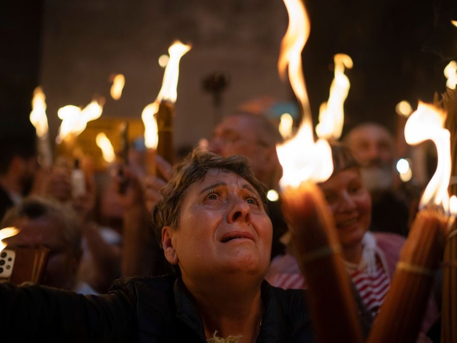 Orthodox worshippers greet ancient ceremony of the Holy Fire in