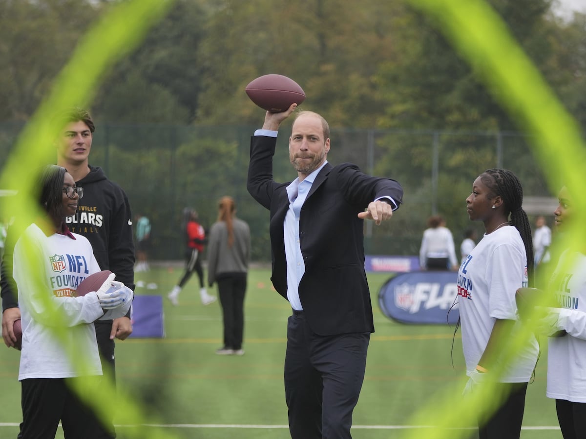 William shows off ‘unbelievable arm’ playing American football with youngsters