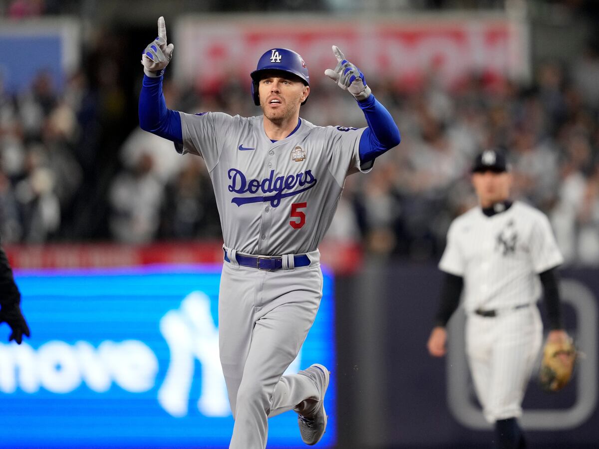 Los Angeles Dodgers hang on late to clinch third win of World Series