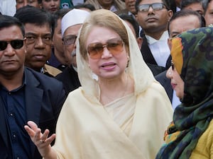 Bangladesh’s former prime minister and Bangladesh Nationalist Party (BNP) chairperson Khaleda Zia leaves after a court appearance