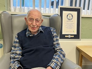 John Tinniswood with his Guiness World Record certificate