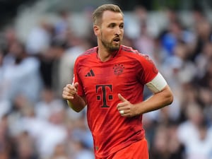 Bayern Munich forward Harry Kane runs