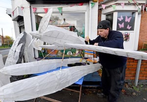 Bruno Edwards working on his sea plane lantern.