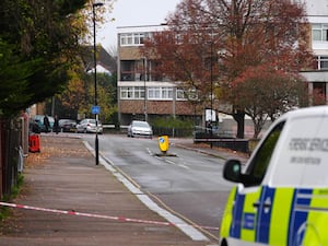 Police at the scene near Wells Park Road in Sydenham, south-east London, after one man died and two people were injured in a shooting