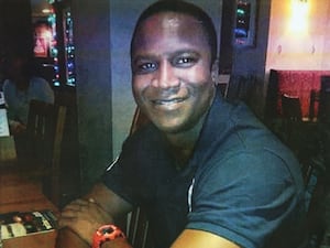 Handout headshot of Sheku Bayoh smiling