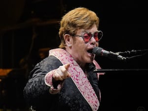 Elton John performs