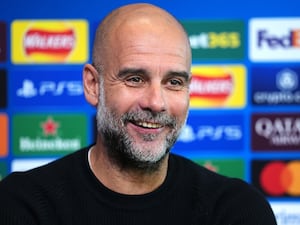 Pep Guardiola faces the media at a press conference