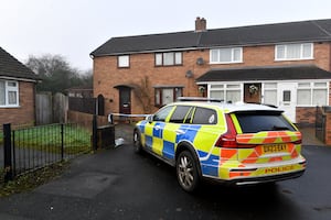 Police pictured at the scene on Elm Road on December 26