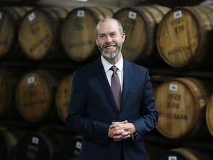 Jonathan Reynolds speaks to media during a visit to Glengoyne Distillery