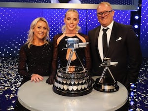 Keely Hodgkinson, centre, after receiving the award for BBC Sports Personality of the Year 2024, with Jenny Meadows, left, and Trevor Painter with their Coach of the Year award