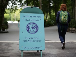 The blue sign at the exit of Portmeirion tourist village in Gwynedd, North Wales