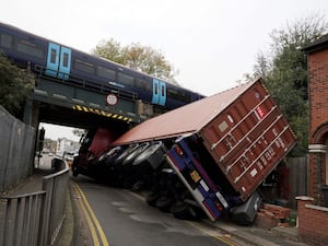 An articulated lorry which hit a bridge in Coombe Valley Road, Dover