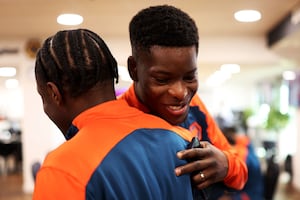  Marshall Munetsi of Wolverhampton Wanderers (R) embraces Jean-Ricner Bellegarde  (Photo by Jack Thomas - WWFC/Wolves via Getty Images)