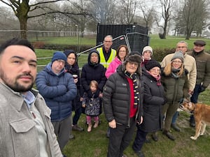 Cllr Ethan Stafford with campaigners who say a phone mast site in Wollescote is causing pollution and safety concerns. Picture Cllr Ethan Stafford free for LDRS use