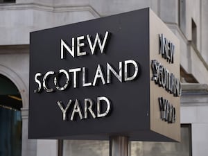 A New Scotland Yard sign