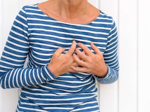 woman suffering chest pain