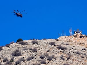 An Israeli helicopter flying over Mount Hermon