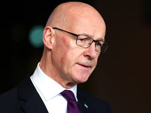 John Swinney photographed in three-quarter profile