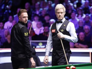 Neil Robertson (right) in action against Judd Trump at the UK Championship in York