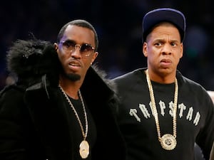 Rap moguls Sean “Diddy” Combs, left, and Jay-Z