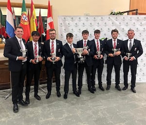 England Men showing off their trophy after winning the Octagonal Match title in Spain.