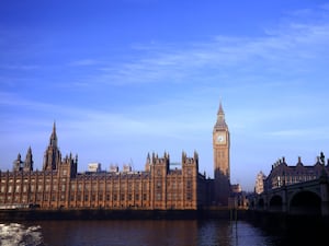 A view of the Houses of Parliament from the south side of the River Thames