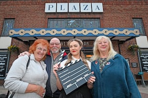 Cynthia and Roger Woodworth, duty manager  Charlotte Gibson and Sandra Turner, chair of the Lanor society, welcome people to the Plaza's 90th anniversary event