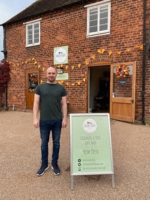 Matt outside his new shop