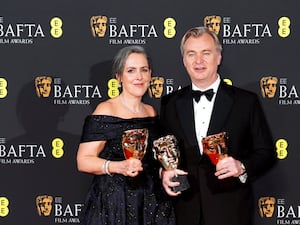 Emma Thomas and Christopher Nolan in the press room after winning the best film award for Oppenheimer during the Bafta Film Awards