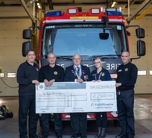 Another charity cheque is presented