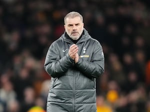 Ange Postecoglou applauds the fans