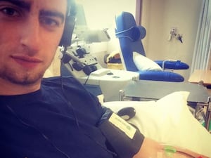 Brad Green making his first stem cell donation at the age of 20