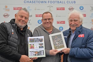 Chasetown chairman Steve Jones, author Paul Mullins and honorary president Mick Joiner.