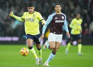 Aston Villa's Diego Carlos (right) and Southampton's Mateus Fernandes battle for the ball.