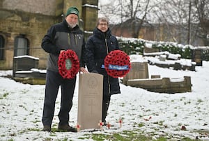 John Nicholls of the Commonwealth War Graves Commission and Catherine Robottom of St James's Church with the new headstone in honour of Lance-Corporal Alfred Nicholls