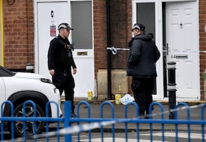 Officers in Redwood Road on Thursday morning