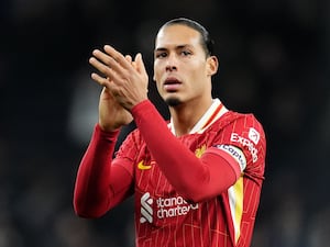 Virgil van Dijk applauds the fans