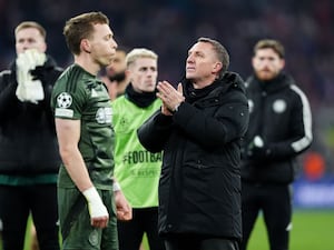 Brendan Rodgers applauds the Celtic fans in the Allianz Arena