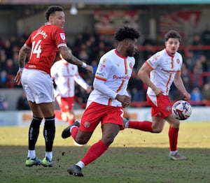 Walsall striker Ellis Harrison on the ball.