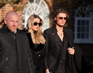 Damian Hurley and Kate Cassidy arrive for the funeral service of One Direction singer Liam Payne at St Mary's Church in Amersham, Buckinghamshire.