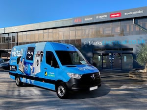 A Marks Electrical van outside a store