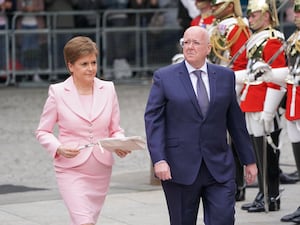 Nicola Sturgeon and Peter Murrell at an official event